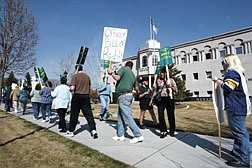 Nevada state workers held a rally in front of the Legislative Building in Carson City, Nev., on Wednesday afternoon, Mar. 12, 2003.  The group is pushing for improved health insurance, collective bargaining and other benefits. (AP Photo/Nevada Appeal, Cathleen Allison)