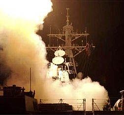** RETRANSMISSION TO PROVIDE ALTERNATE CROP ** Three U.S.S. Donald Cook based Tomahawk Land Attack Missiles are seen as they are fired Thursday morning, March 20, 2003, in the Red Sea, as they head towards Iraq. (AP Photo/Chief Petty Officer Alan J. Baribeau, HO)