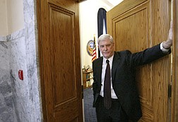 Nevada Gov. Kenny Guinn talks outside his office at the Capitol in Carson City, Nev., Monday, June 2, 2003. With a midnight adjournment of the 2003 legislative session nearing, Nevada lawmakers braced for do-or-die votes Monday on a tax compromise that would fill Nevada&#039;s $860 million budget gap. (AP Photo/Nevada Appeal, Cathleen Allison)