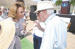 Governor Guinn&#039;s chief of staff Mary Bell, left, talks with retired doctor Richard Petty. Petty was one of two people that were part CTH&#039;s original groundbreaking in 1948, he also was the doctor that delivered Mary Bell. photo
