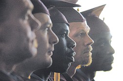 Inmates of Northern Nevada Correctional Center listen to guest speaker Senator Mark Amodei R-Carson City during a graduation ceremony at the prison Wednesday afternoon.  Inmates from left are: Edward Macafee, Gregory Johnstone, Gregory Jennings, John Hart,  and Steven Crowley.   photo by Rick Gunn