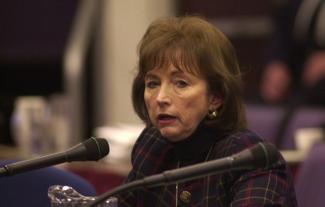 Jeannine Coward, a former state assistant controller, testifies Thursday, Dec. 2, 2004, during Controller Kathy Augustine&#039;s impeachment trial in Carson City, Nev. Coward said Augustine threw things at her and told her to handle various 2002 campaign jobs even after Coward objected to the activity. (AP Photo/Reno-Gazette-Journal, Candice Towell)