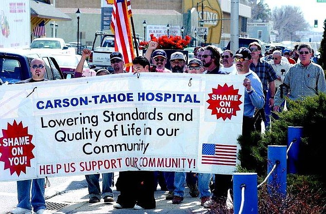 A group of construction workers all belonging to the Carson City Fairness committee protested the lack of health benefits and wages at the construction site at the Carson-Tahoe Hospital&#039;s new regional medical center in north Carson City.     on Carson Street Thursday afternoon.  The workers