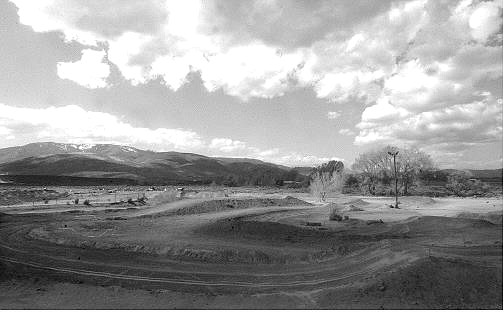 Rick Gunn/Nevada Appeal Clouds drift past Champion Motor Speedway&#039;s motocross track Tuesday afternoon. Speedway officials are going before the Carson City Planning Commission to expand hours at the track.