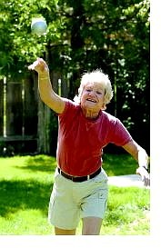 Rita Plank of Carson City practices a shotput throw Thursday afternoon at her home. Plank, the widow of the late Jon Plank, a Carson City supervisor, will compete July 24 in the Senior Olympics in Olympia, Wash.   Rick Gunn Nevada Appeal