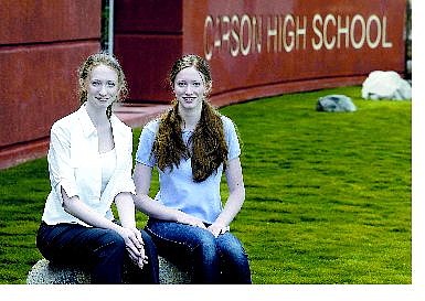 Cathleen Allison/Nevada Appeal Identical twins Rebecca, left, and Erin Higgs, 18, are two of this years Carson High School valedictorians.  The two have taken the exact same classes and have the same GPA.