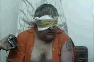 This image taken from an Islamic website, Tuesday June 15, 2004, shows a frame from a video of  blindfolded American hostage, Paul M. Johnson Jr., being held in Saudi Arabia. Johnson Jr., 49, was abducted Saturday, June 12, 2004.  Al-Arabiya television reported Friday, June 18, 2004, that Johnson Jr. has been beheaded.  (AP Photo)