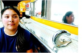BRAD HORN/Nevada Appeal Daza Talas poses next to a fire engine at Fire Station No. 2 in Carson City Thursday afternoon.