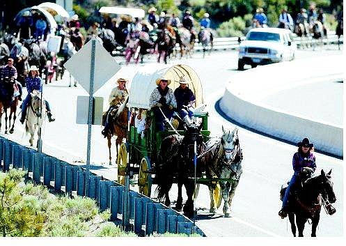 Brad Horn/Nevada Appeal The Highway 50 Association Wagon Train heads up Spooner Summit along Highway 50 West Saturday outside of Carson CIty. The train left Fuji Park at 7 a.m. and will arrive in Placerville, Calif., June 26.
