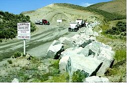 Belinda Grant/Nevada Appeal Cinderlite trucks enter the company&#039;s Goni Road pit.