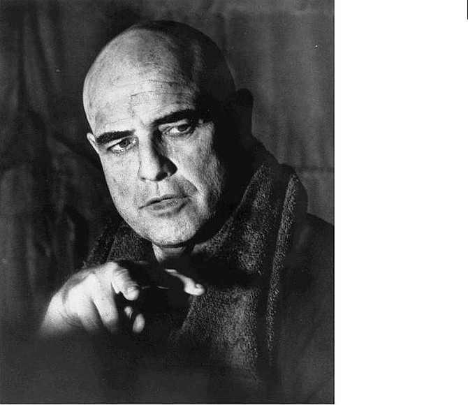 **FILE**Marlon Brando plays seemingly-mad &quot;Col. Kuntz&quot; in United Artists &quot;Apocalypse Now&quot; in 1979 Brando, who revolutionized American acting with his Method performances in &quot;Streetcar Named Desire&quot; and &quot;On the Waterfront&quot; and went on to create the iconic characterization of Don Vito Corleone in &quot;The Godfather,&quot; has died, his lawyer said Friday, July 2, 2004. He was 80.(AP Photo/United Artists)