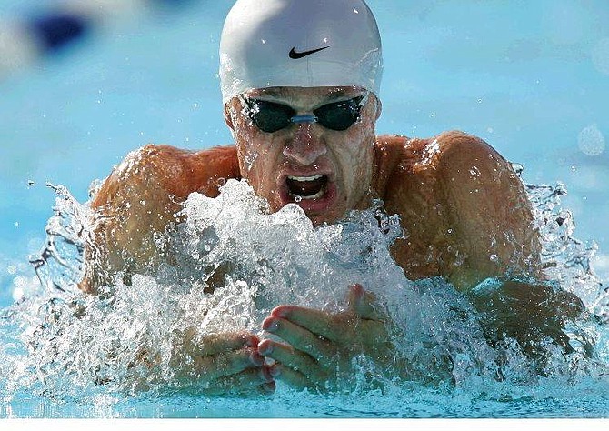 Brendan Hansen comes up for air on his way to winning the Men&#039;s 100 Meter Breastroke final with a time of 59:30 seconds for a new world record at the U.S. Olympic swim trials in Long Beach, Calif., Thursday, July 8, 2004.  (AP Photo/Mark J. Terrill)