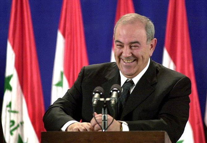 Iraqi Prime MInister Iyad Allawi gives a press conference in Baghdad, Iraq Thursday, July 15, 2004. Allawi said that Iraq&#039;s government will create a new intelligence service specifically geared toward tackling the nearly 15-month-old insurgency in the country.(AP Photo/Samir Mizban)