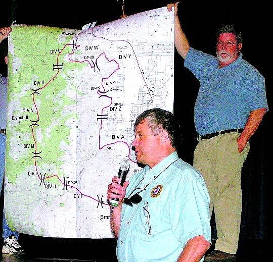 Geoff Dornan/Nevada Appeal  Incident Commander Kim Martin displays a map tracing the Waterfall fire&#039;s activity over the last 48 hours at the Friday morning Town Hall meeting located inside the Community Center.