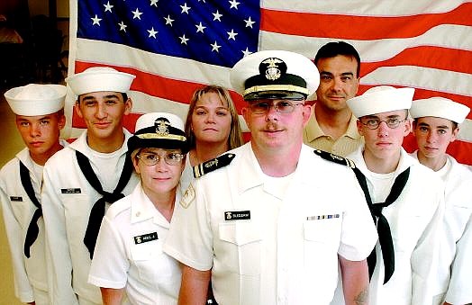 Rick Gunn/Nevada Appeal Several members of the Carson City U.S. Naval Sea Cadet Corps will soon head for two weeks of boot camp at Port Hueneme, Calif., or Fort Lewis, Wash. Standing with three officers are, from left: Beau Slocum, 14; Jordan Snyder, 15; executive officer Annie Rees; officer Laura Snyder; Lt.j.g. Robert Bledsaw; officer Jim Snyder;, John Mooney, 14; and Justin Ryker, 13.