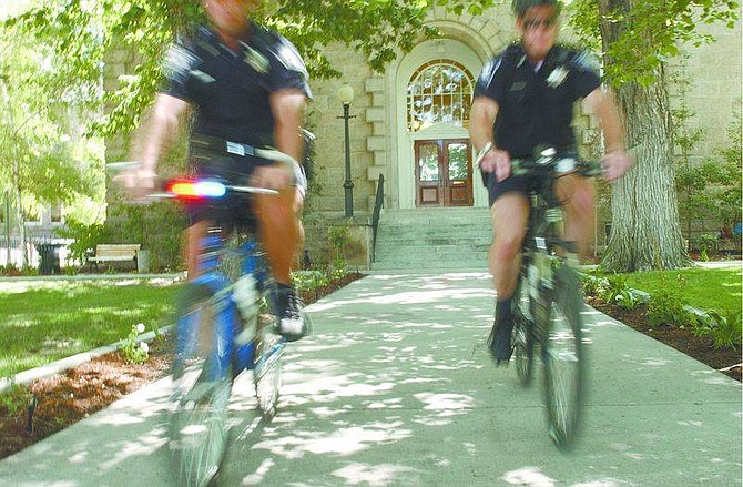 Rick Gunn/Nevada AppealCapitol Police bike patrol officers Michael J. Fox, left and Richard Mraz hit the streets near the north entrance to the Capitol grounds.