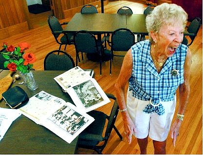 BRAD HORN/Nevada Appeal Shirley Cunningham shares a laugh with a former classmate while setting up for Carson High School&#039;s class of 1952&#039;s 52nd reunion on Thursday afternoon at the Brewery Arts Center.