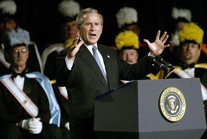 President Bush speaks to about 2000 Knights of Columbus members and their families at the 122nd Annual Supreme Council Meeting, Tuesday, August 3, 2004 in Dallas. Bush raised $1.6 million for the Republican Party on Tuesday and praised the work of faith-based organizations that help the needy in an election-year appeal to Roman Catholic voters.  (AP Photo/Donna McWilliam)