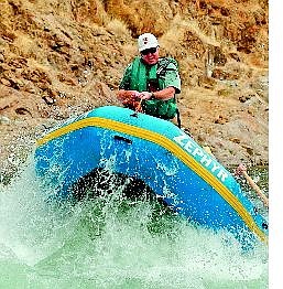 Associated Press Zephyr Whitewater Expeditions owner Bob Ferguson rides the rapids of the King&#039;s River June 14 in King&#039;s Canyon National Park, Calif.
