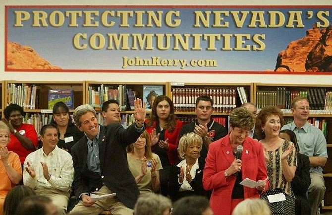 John Kerry appears Tuesday at Cadwallader Middle School in Las Vegas. Kerry spoke about the public impact of the proposed Yucca Mountain national nuclear waste site. At right is U.S. Rep. Shelley Berkley, D-Nev.(AP Photo/Joe Cavaretta)