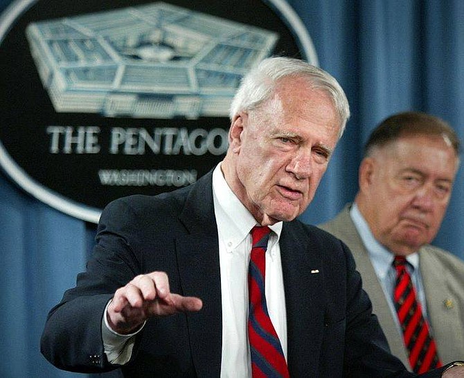 Former secretary of defense James Schlesinger, left, and retired Gen. Chuck Horner, members of the Detention Operations Review Panel speak with the media at the Pentagon, Tuesday, Aug. 24, 2004, in Washington. The panel delivered their final report to Defense Secretary Donald Rumsfeld. (AP Photo/Lawrence Jackson)