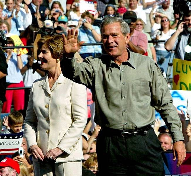 President Bush and first lady Laura Bush are introduced at a campaign rally at Lackwanna County Stadium Friday, Sept. 3, 2004, in Avoca, Penn. Bush visited the battleground state of Pennsylvania as part of his post-convention campaign swing through three states he lost in 2000. (AP Photo/Pablo Martinez Monsivais)