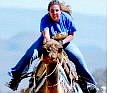 Appeal file photo by Brad Horn Nevada Appeal features editor Teri Vance races her camel during the media race in Virginia City last year.