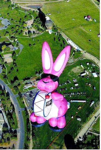 Becky Bosshart/Nevada Appeal The Energizer Bunny balloon, the largest balloon in America at 15 feet taller than the Statue of Liberty, floats above a north Reno neighborhood. Thursday morning&#039;s mass ascension also included Eagle, Lilly and Joey the bees and Bud E. Beaver. The Great Reno Balloon Race at Rancho San Rafael Park ends Sunday.