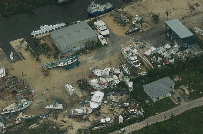 The marina of Georgetown is seen in this aerial view after the passing of Hurricane Ivan in Grand Cayman Islands, Monday, Sept. 13, 2004. (AP Photo/Walter Astrada)