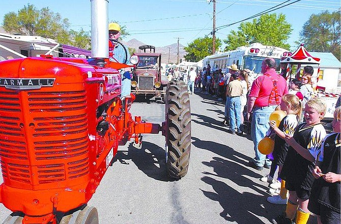 Nevada Appeal file photoWendell Newman of Carson City rolls through town on a tractor during the 2003 Dayton Valley Days parade.