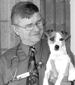 Dr. Gary L. Ailes of  Carson City, a doctor at Sierra  Veterinary Hospital, is promoting Responsible Dog  Ownership Day, which is today.   Courtesy photo