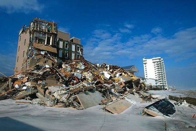 The Crystal Beach condominium, destroyed by Hurricane Ivan, is seen Thursday, Sept. 16, 2004, in Orange Beach, Ala. (AP Photo/Mobile Register, Kiichiro Sato)
