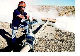 Kim Lamb/Appeal News Service Shawn Henry, above, shoots 376-degree steam into a sand pit. The procedure is often used when geothermal facilities are started to check steam flow.