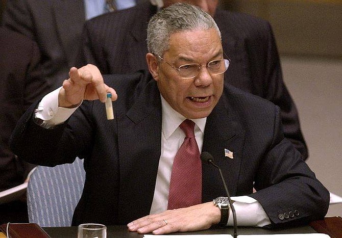 U.S. Secretary of State Colin Powell holds up a vial that he said could contain anthrax as he presents evidence of Iraq&#039;s alleged weapons programs to the United Nations Security Council in this Feb. 5, 2003 file photo. Powell has told top aides he intends to resign from President Bush&#039;s Cabinet, high-ranking State Department officials said Monday, Nov. 15, 2004. (AP Photo/Elise Amendola)