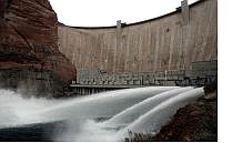 Associated Press Water is released from Glen Canyon Dam into the Colorado River near Page, Ariz., on Sunday.