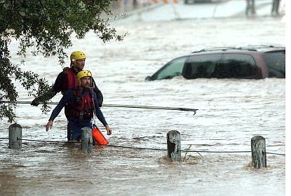AssociatedPress San Antonio Fire Department personnel search an area around a flooded van along Henderson Pass at Lorence Creek Park after a man was reported missing from a van that became stuck in high water Monday in San Antonio.