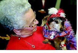 Peter Thompson/Nevada Appeal Maureen Griffith celebrates with her dachshund, Heidi. The four-legged looker took home the title of &quot;Carson City&#039;s Cutest Dog.&quot;