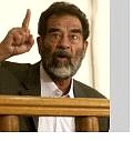 Saddam Hussein appears in a courtroom at Camp Victory, a former Saddam palace on the outskirts of Baghdad, in this July 1 photo.