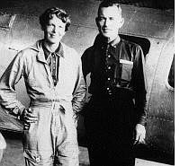 Associated Press Famed aviatrix Amelia Earhart and her navigator, Fred Noonan, pose in front of their twin-engine Lockheed Electra in Los Angeles in May 1937, prior to their attempt to fly around the world.