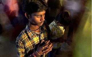 Devotees pray at St. Mary&#039;s Basilica on Christmas in Bangalore, India, Saturday. Dec. 25, 2004. Although Christians comprise only two percent of the population among a Hindu majority, the holiday is observed across the country as an occasion to celebrate.  (AP Photo/Gautam Singh)