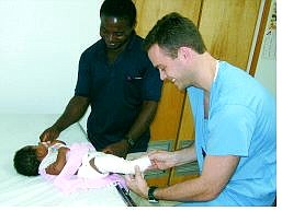 Provided by Steve Bannar Orthopedist Dr. Steve Bannar of South Lake Tahoe tends to an infant with an injured leg on St. Lucia island in the Caribbean.