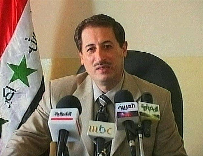 This is a  television image taken from APTN footage taken on Dec. 25, 2004, which shows the Governor of Baghdad Ali al-Haidari,  speaking at a press conference. Al-Haidari was assassinated by gunmen in Baghdad, Tuesday,  Jan. 4, 2005.  (AP Photo/ APTN)  ** TV OUT   **