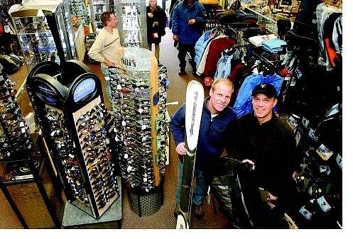 Rick Gunn/Nevada Appeal Two of the new owners of The Sporting Rage, Dave Goodwin, left, and Kevin Wagner, stand in the store Friday afternoon. Goodwin, Wagner and Ryan Frost (not shown), all employees of the Carson City shop, recently bought the shop from founder Kevin Gallegos.