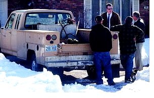 Carson City sheriff&#039;s  detectives talk with the owner of a stolen truck abandoned by thieves in a driveway on Carville Circle on Wednesday. The Sheriff&#039;s Department arrested two suspects.  Rick Gunn Nevada Appeal