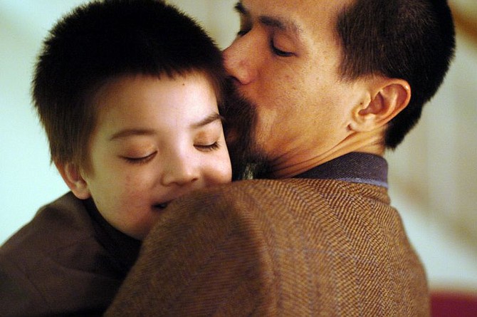 Lam Do holds his son Luke Do, 4, at their home in San Jose, Calif., on Thursday, Jan. 27, 2005.  Luke Do was a lively 18-month-old awaiting the birth of his first sibling when he was diagnosed with a rare form of leukemia. The hopes of his parents, both doctors in San Jose, Calif., immediately turned to a bone marrow transplant, but they soon learned some distressing news - Luke&#039;s ethnic heritage made him a tough match.   (AP Photo/Jakub Mosur)