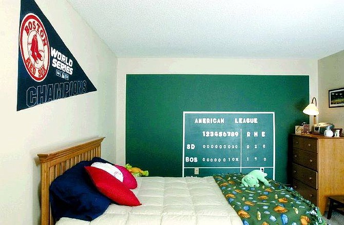 JOHN WOIKE/Los Angeles Times News Service Michael Nevico&#039;s bedroom features a World Series pennant and &#039;The Green Monster&#039; painted on his bedroom walls. His mom, Johannah, and a friend painted the room during this year&#039;s playoffs and World Series.
