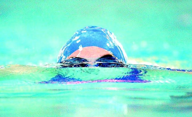 BRAD HORN/Nevada Appeal Carson freshman Carrie Lynn competes in the breaststroke in the 200 meter individual medely at the Carson Aquatic Center Thursday.