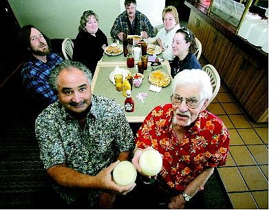 BRAD HORN/Nevada Appeal Tequila Dan&#039;s owners from left Dan Hague and Alfred Verschell toast margaritas with a table of loyal customers Thursday afternoon. The customers from right counterclockwise are Arlana Zimmerman, 16, Shari Hobson, Cal Hobson, Sandra Zimmerman and Lee Zimmerman.