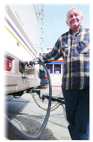 Dennis Baggett, of Missoula, Mont., stops in Carson City on Friday afternoon to fill up his Bounder Fleetwood recreational vehicle. Baggett said he&#039;ll keep driving even though gas prices are high, but he&#039;ll complain about it.                              Rick Gunn/Nevada Appeal