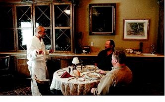 Adele&#039;s owner and chef Charlie Abowd speaks with Bill Fergus of Irwin Union Bank, right, and Mike Grim, vice president of commercial lending, about the expansion of the restaurant. TOP PHOTO: Charlie Abowd.
